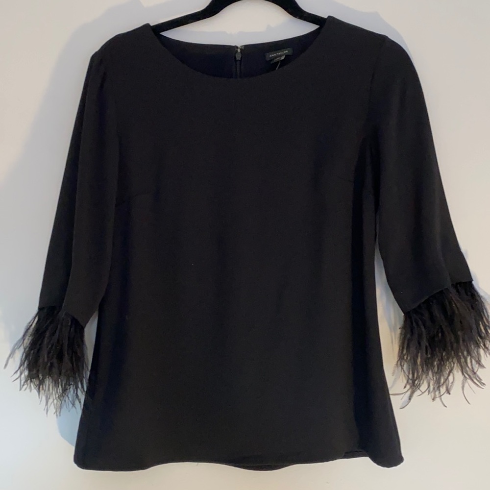 Ann Taylor Black blouse with feather sleeves